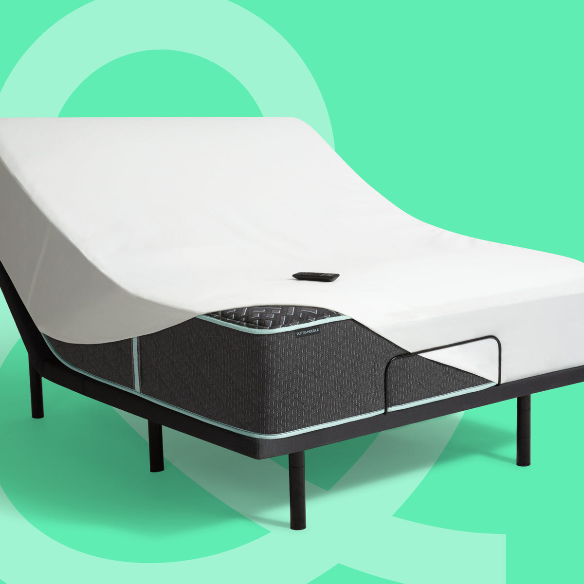 Tuft & Needle Mint Luxe Hybrid Mattress with mattress protector on a baselogic Pearl Adjustable Base with the head raised